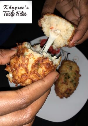 A picture of Cheesy potatoes and rice balls.
