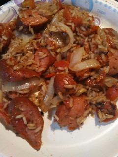 A picture of Rice, Roasted Tomatoes, and Sausage, with Preserved Lemon Brine.