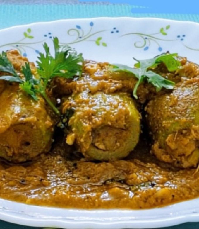 A picture of Niramish Potol er Dolma/ Stuffed pointed Gourds with Cottage Cheese (bengali veg sabzi).