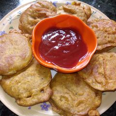 A picture of Bottle gourd fritters.