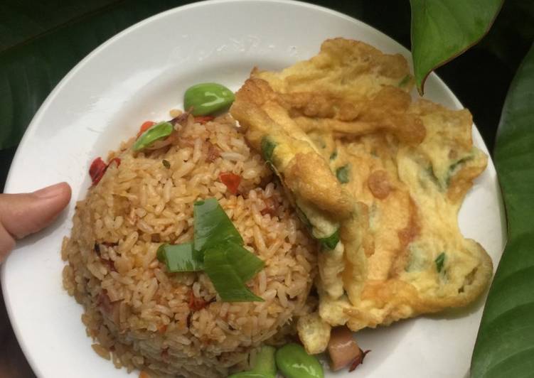 Bagaimana Menyiapkan Nasi Goreng Cumi Petai Anti Gagal