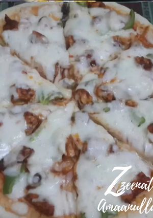 A picture of Thin Crust Chicken Tikka Pizzas.