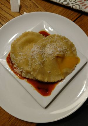A picture of Raviolo Al Uovo.