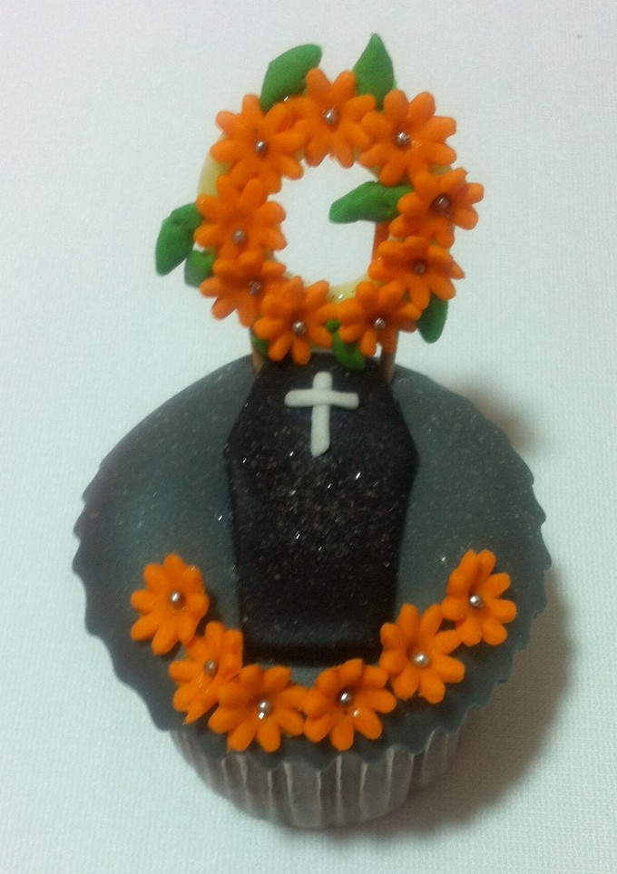 Una foto de Cupcake de tumba fondant !!