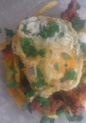 Una foto de Huevos rotos con jijas 