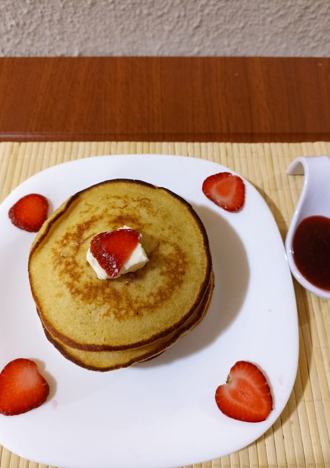 Una foto de Hot cakes con mermelada de fresa