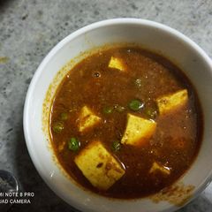 A picture of Matar Paneer.