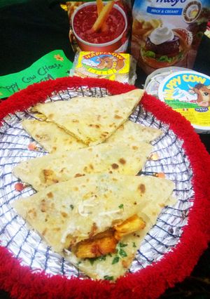 A picture of Chicken tikka cheese paratha.