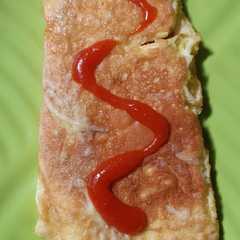 รูปของ Dadar telur keju