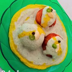 A picture of Malai Kofta in white gravy.