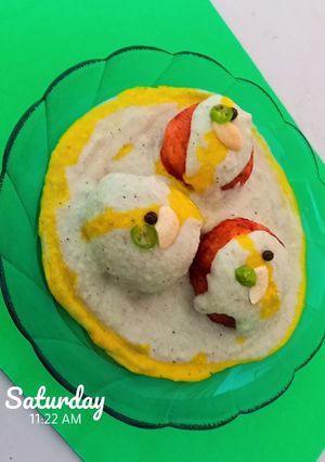 A picture of Malai Kofta in white gravy.