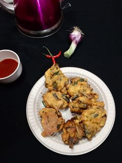 পেঁয়াজ কলির পকোড়া(peyaj kolir pokora recipe in Bengali) রেসিপির প্রধান ছবি