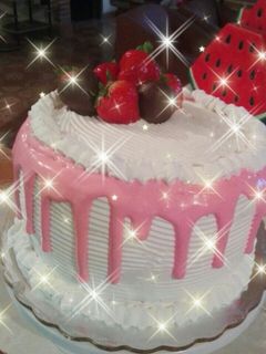 Una foto de Pastel de fresa con crema