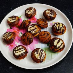 A picture of Banana Atta Muffin in Appe Pan.