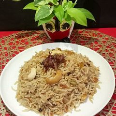 A picture of Ghee Rice.