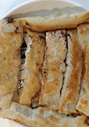 A picture of Homemade Potsticker Wrappers and Potstickers.