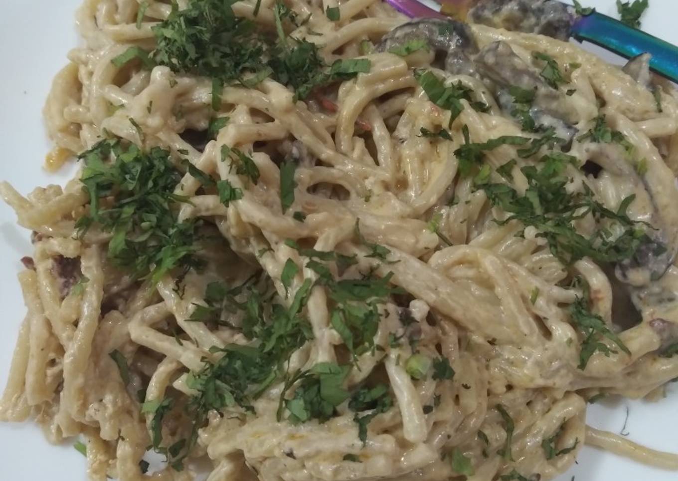 Spaghetti con champiñones