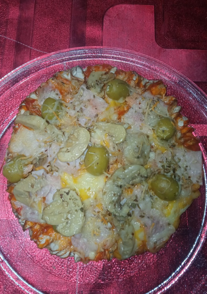 Una foto de Pizza con base de seta (en catalán Apagallums)