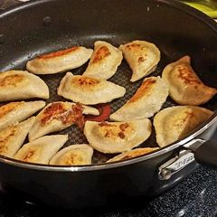A picture of Pork and ginger potstickers.