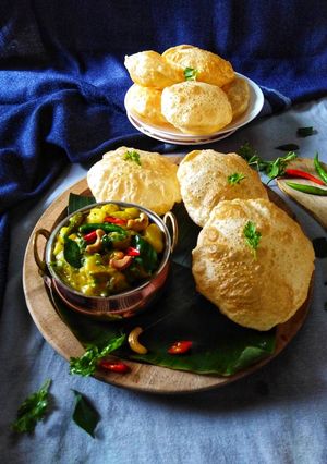 A picture of Potato masala with poori.