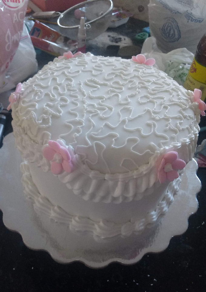 Una foto de Torta de fondant relleno de mousse de coco