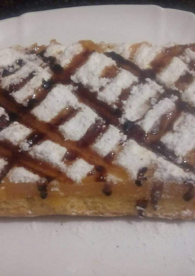 Una foto de Tocino de cielo sobre bizcocho 