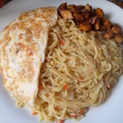 A picture of Simple Noodles and Omelette with plantain.