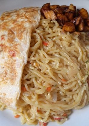 A picture of Simple Noodles and Omelette with plantain.