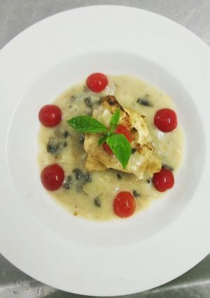 A picture of Baked chicken with mushroom sauce.