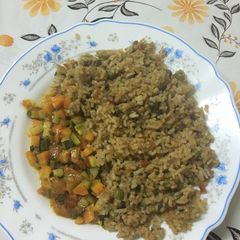 A picture of Vegetable fried rice and vegetable stew.