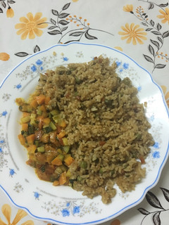 A picture of Vegetable fried rice and vegetable stew.