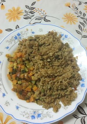 A picture of Vegetable fried rice and vegetable stew.