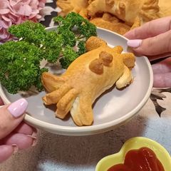 A picture of Cheesy Puff Pastry Spiders — A Fun Halloween Snack.
