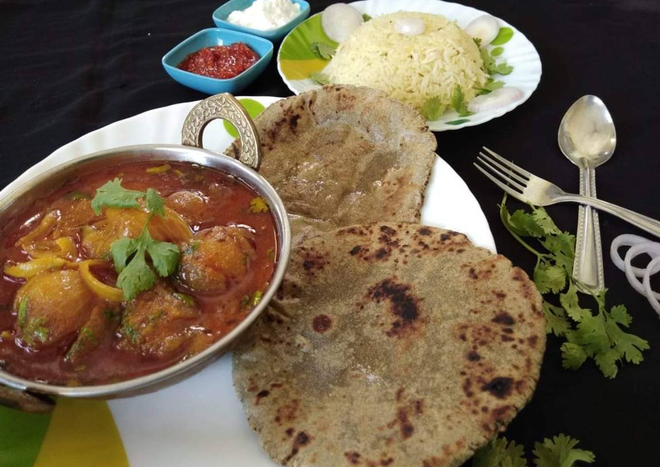 Kathiyavadi stuff onion with bajra roti and jeera rice