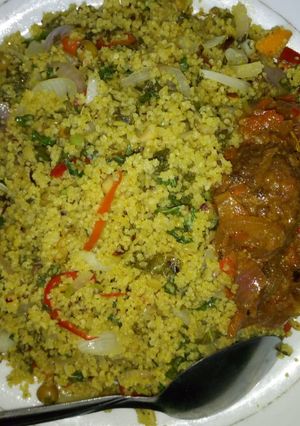 A picture of Vegetable couscous with meat.