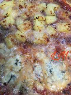 Una foto de Pizza mitad y mitad