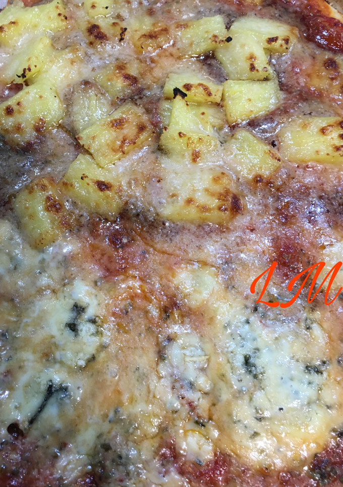 Una foto de Pizza mitad y mitad