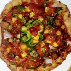 A picture of Veggies Pizza without cheese.