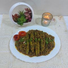 A picture of Bitter gourd Staffing Mutton mince.