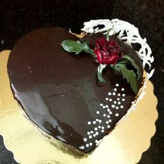 A picture of Chocolate Mirror Glaze Cake without Egg, Maida & heart cake Mold.