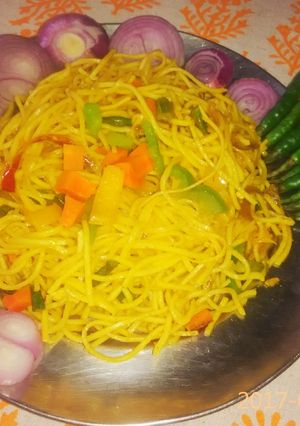 A picture of Veg noodles in indian style.