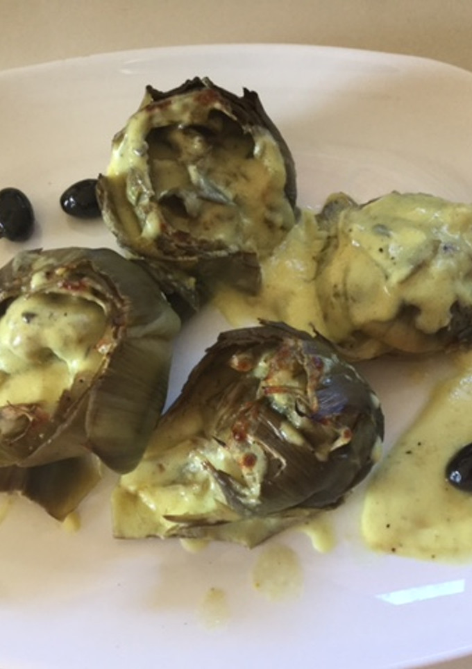 Una foto de Alcachofas con queso y curry