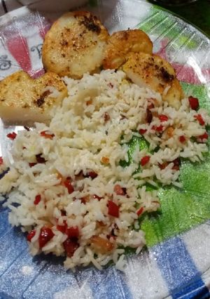Una foto de Papa al horno con arroz