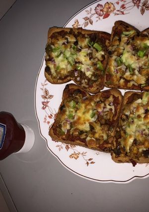 صورة لوصفة بيتزا صحية بالتوست🍕