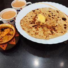 A picture of Paneer Pyaz Paratha.