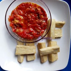 Tomatoes sauce paired with fried yam A picture of Tomatoes sauce paired with fried yam.