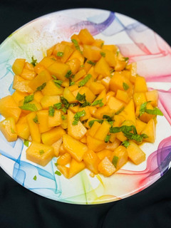 A picture of Musk melon mint salad.