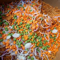 A picture of Garnished jollof rice.