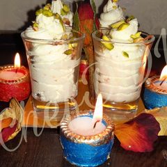 A picture of Kachha Gulla Posset Fusion Bengali Dish.