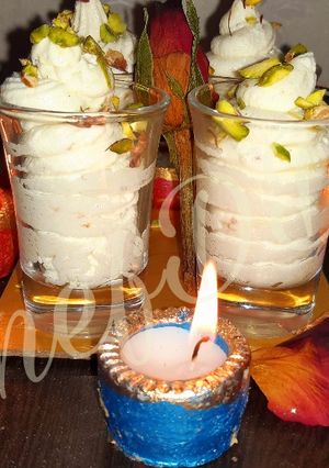 A picture of Kachha Gulla Posset Fusion Bengali Dish.